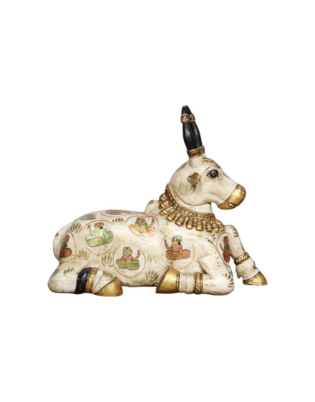 Decorative cow figurine with jewelry and painted details on a white background