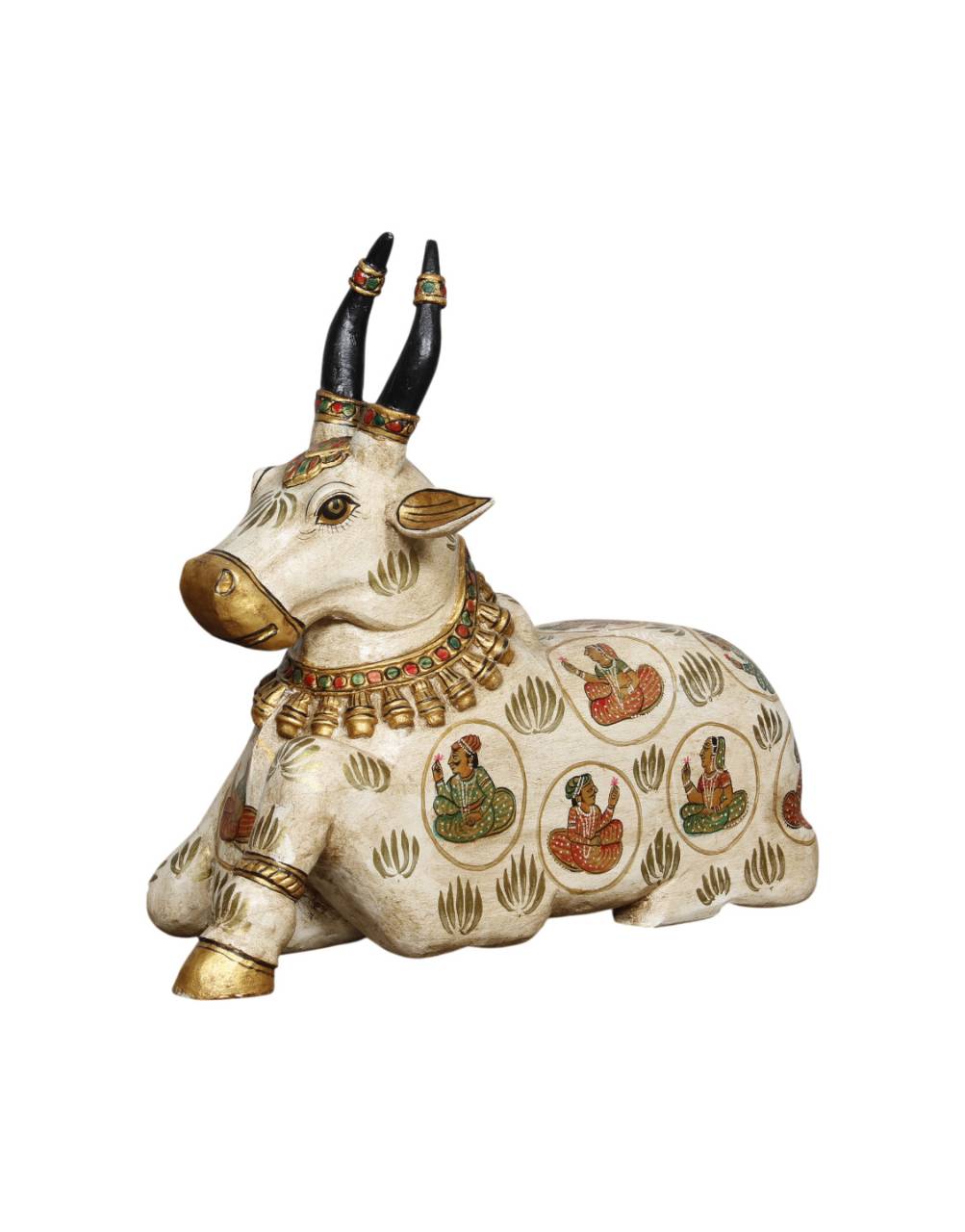 Decorative statue of a bull with intricate designs on a white background