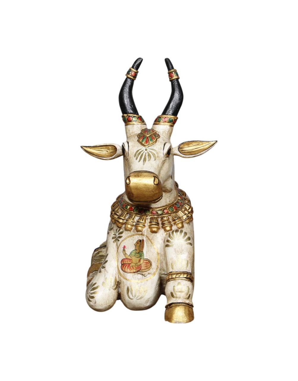 Decorative figurine of a bull with intricate designs on a white background
