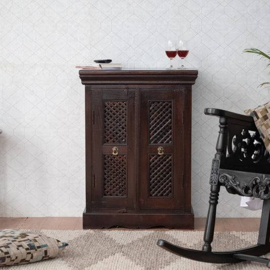 Wooden cabinet with decorative elements in a room setting