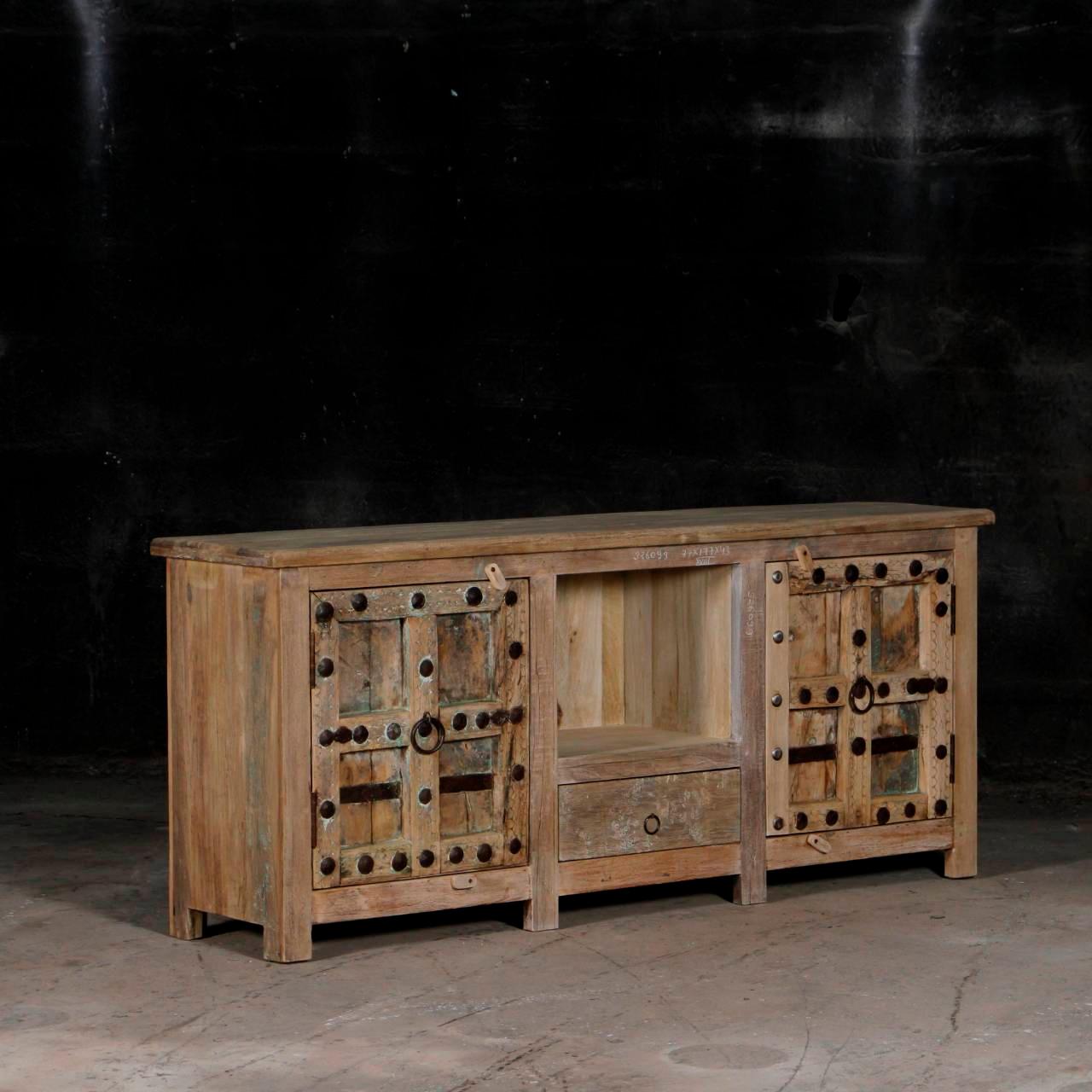 Wooden sideboard with rustic design on a dark background