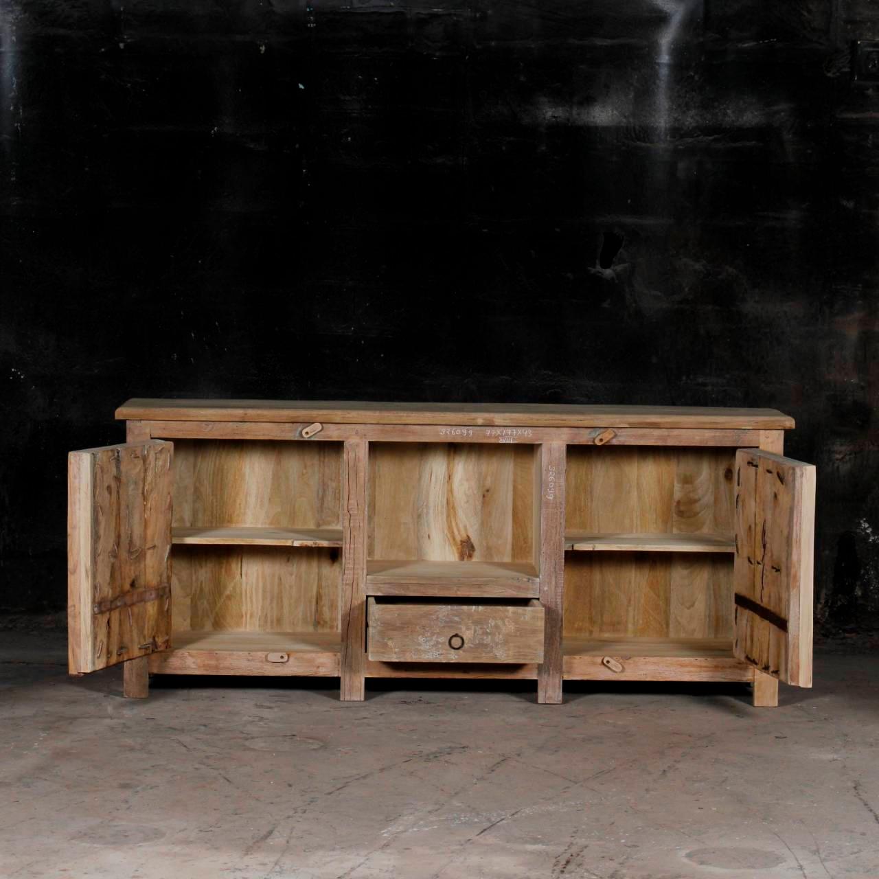 Wooden cabinet with open doors on a dark background