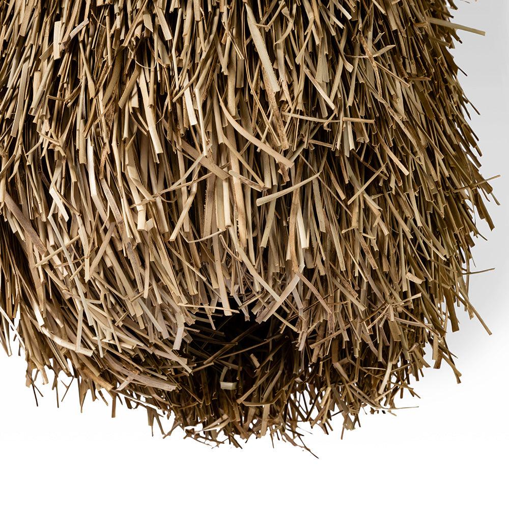Close-up of a ball of straw on a white background