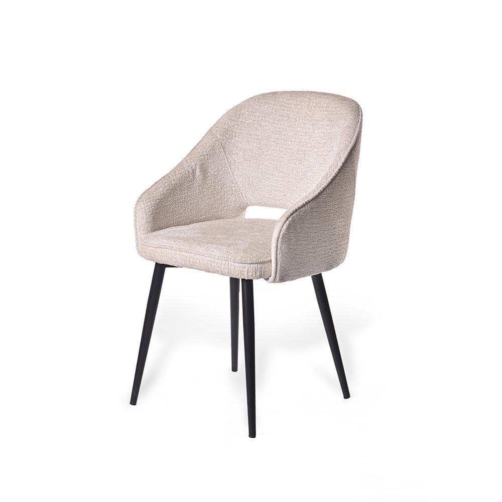 Beige armchair with black legs on a white background