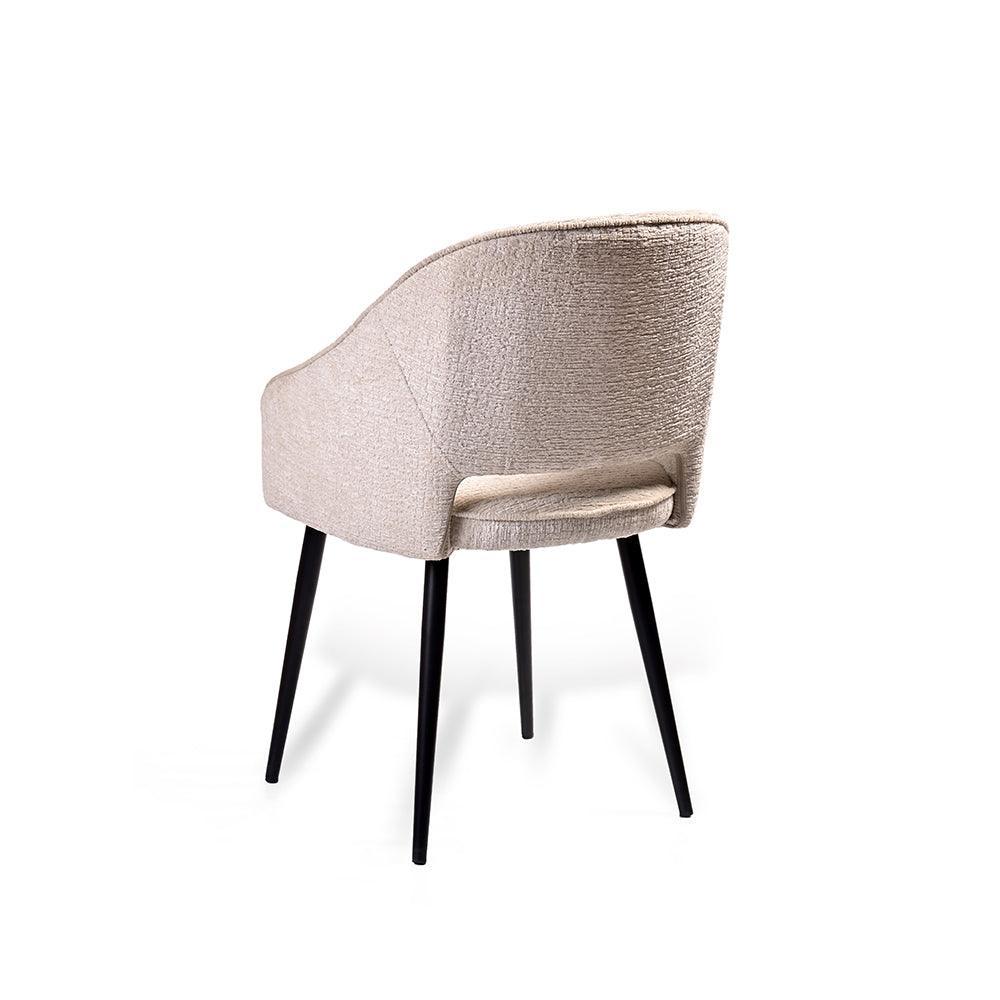 Beige armchair with black legs on a white background