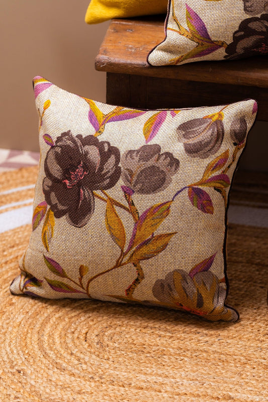 Close-up of floral embroidery on jute brown cushion cover showing thread detail and texture – Tesu Cushion Covers