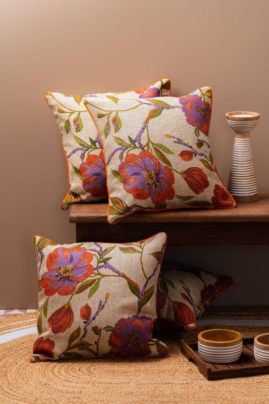 Jute Orange Floral cushion cover with bright embroidered flowers on natural orange jute – Tesu Cushion Covers