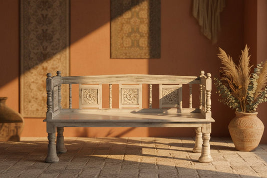 Ornate garden bench inspired by Mughal design, featuring intricately carved details and elegant craftsmanship, placed in an outdoor setting with a regal and timeless aesthetic.