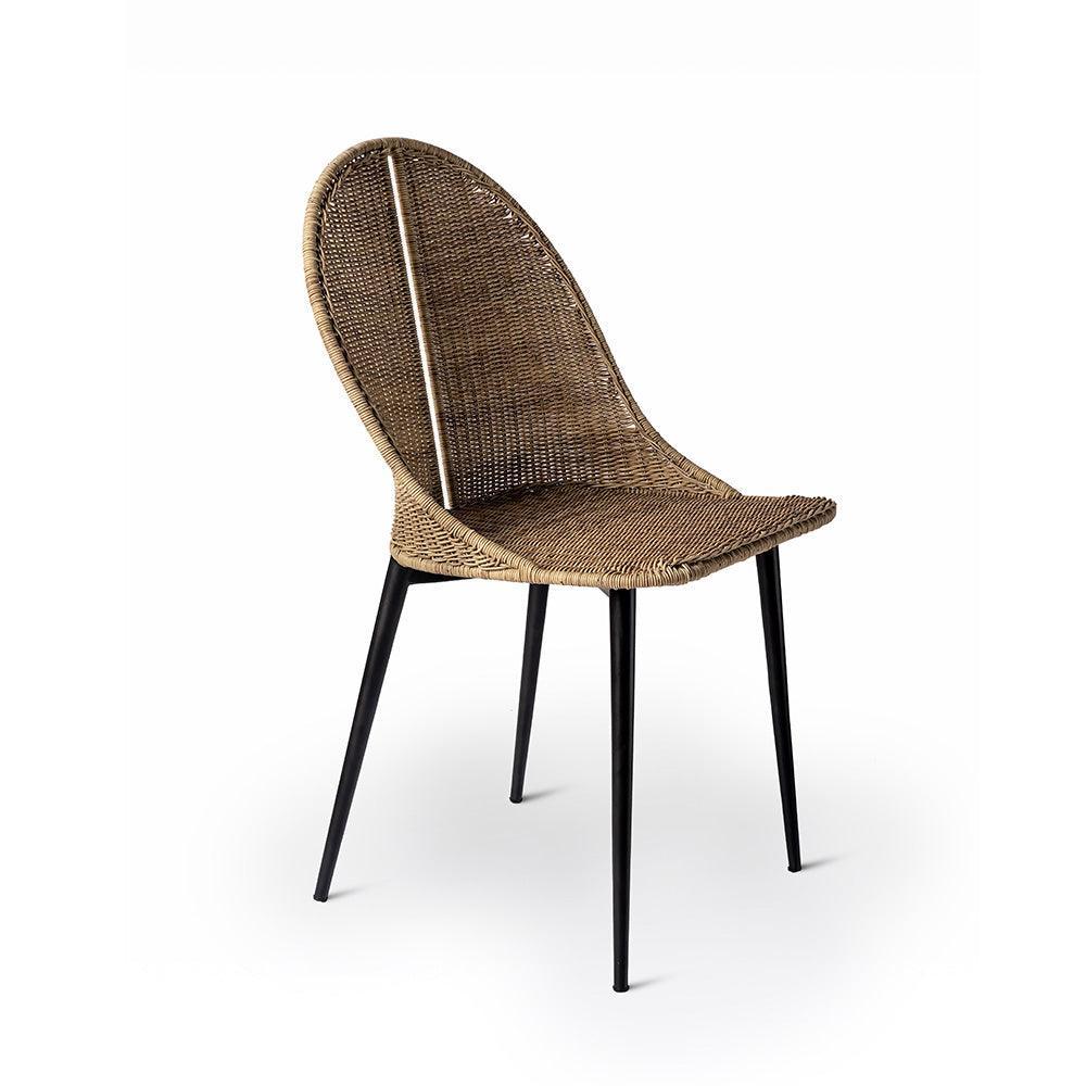 Wicker chair with black metal legs on a white background