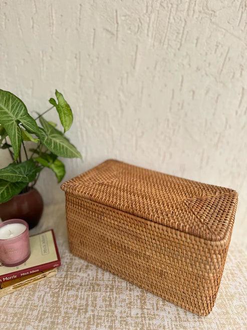 Detail shot of handwoven rattan box highlighting artisan craftsmanship and natural material quality