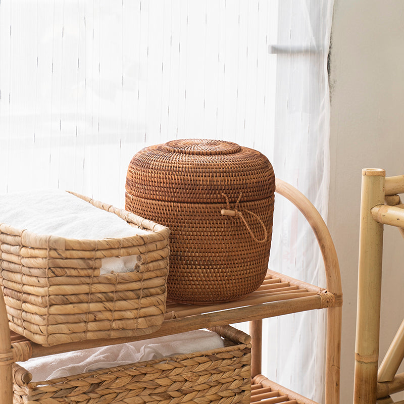 Rattan Storage Box With Lid round for makeup outdoor boho table decor exclusive collection.Enhance your Dream Home with our curated selection of premium Home Décor items.  A rattan storage box is a versatile and stylish piece of furniture that can add both functionality and aesthetic appeal to any room. Whether you want to declutter your living space, organize your outdoor area, or simply add a decorative touch, a rattan storage box can be an excellent choice. tesu