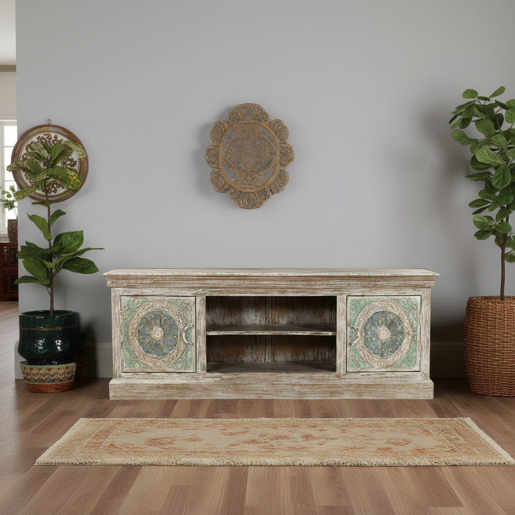 Bring home a regal touch of heritage with the Royal Mandala Plasma Stand, exquisitely handcrafted from solid mango wood. 