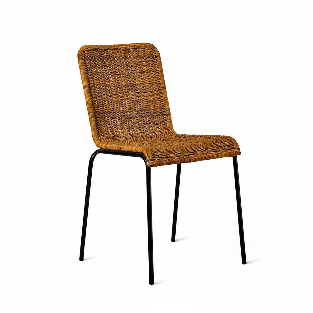 Wicker chair with black metal legs on a white background