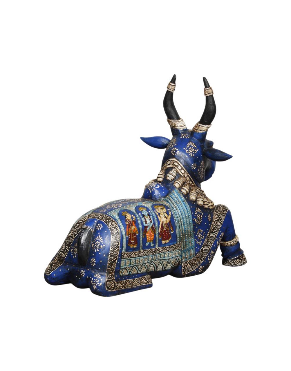 Decorative figurine of a bull with blue and gold colors on a white background