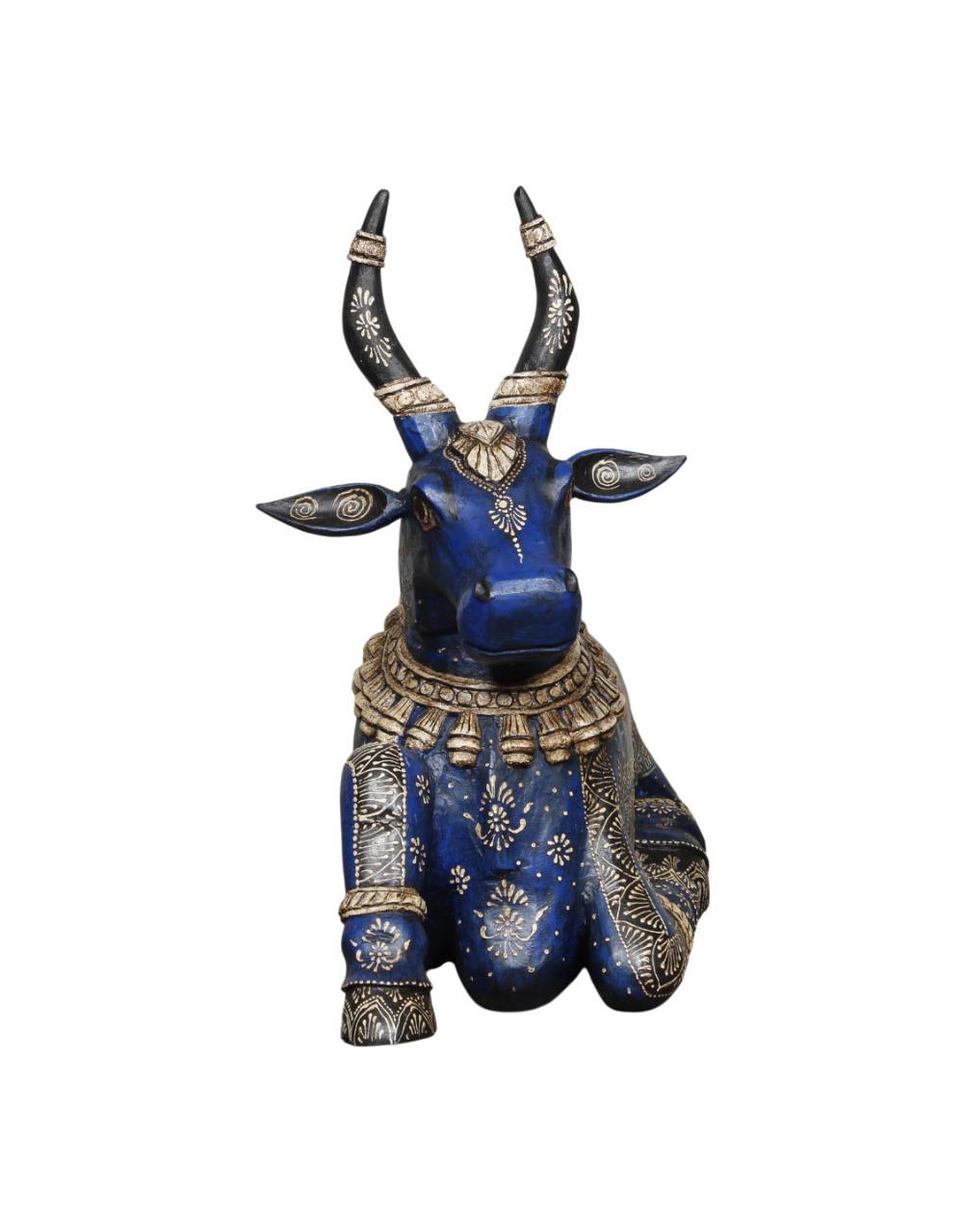 Decorative blue bull figurine with intricate designs on a white background