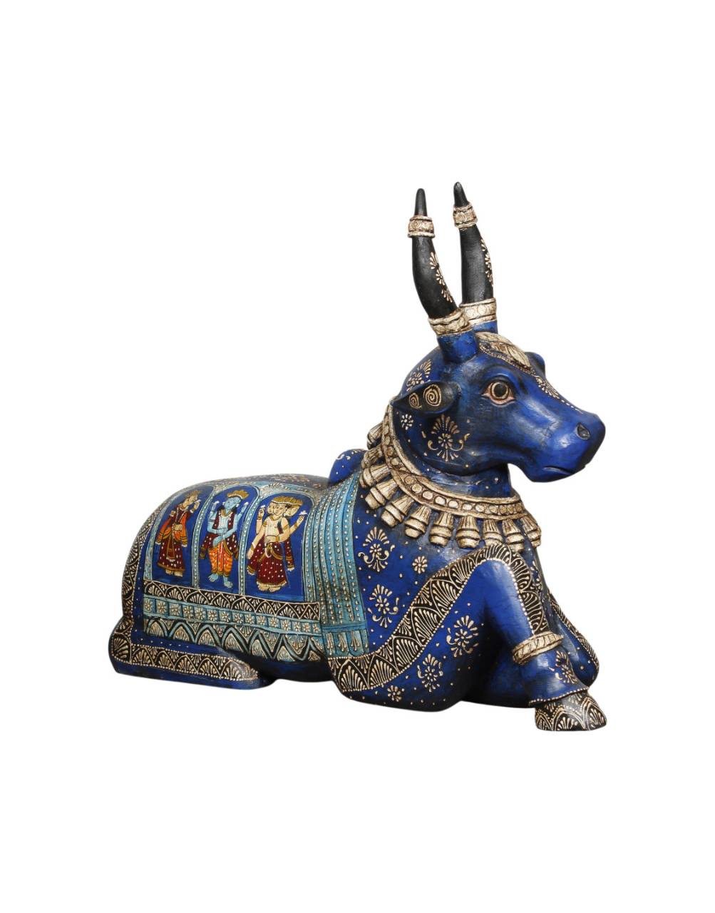 Decorative figurine of a blue bull with intricate designs on a white background