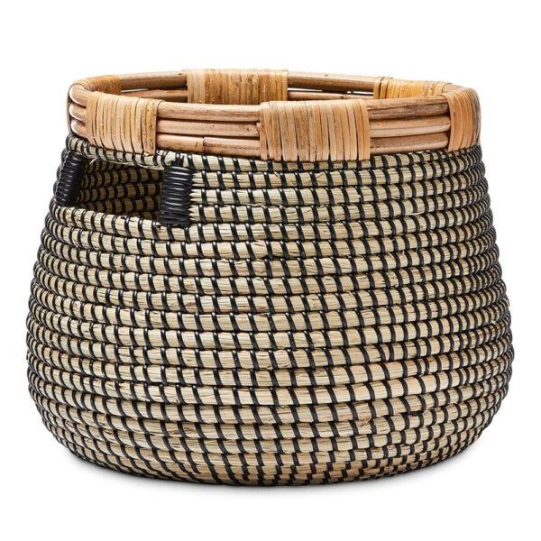 Detail shot of natural seagrass weaving pattern on multipurpose storage and plant holder basket