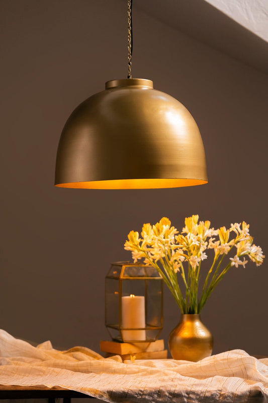 Swarna round antique brass pendant lamp with circular metal shade and warm glow – Tesu Lamps & Lighting