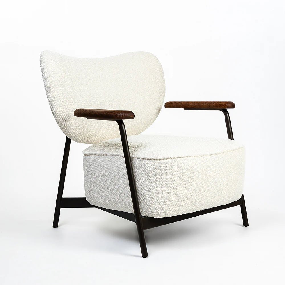 Modern armchair with white cushion and wooden armrests on a white background