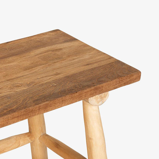 Wooden table with a light brown finish on a white background
