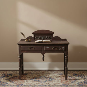 Vintage wooden desk with intricate carvings 