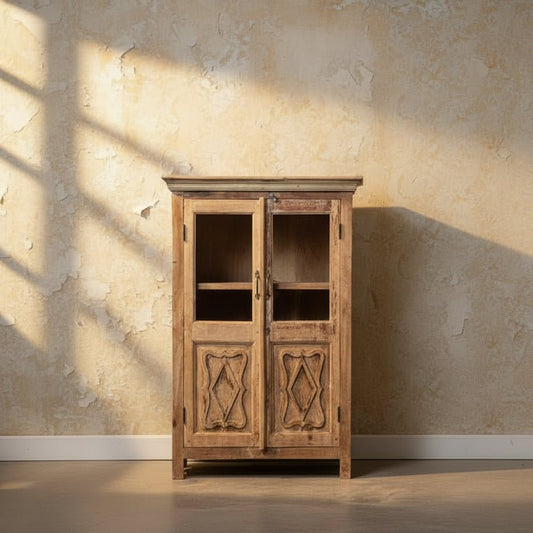 Vintage wooden cabinet with carvings in a vintage background