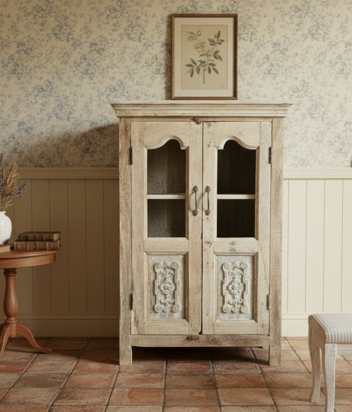 Wooden cabinet with glass doors in a rustic setting