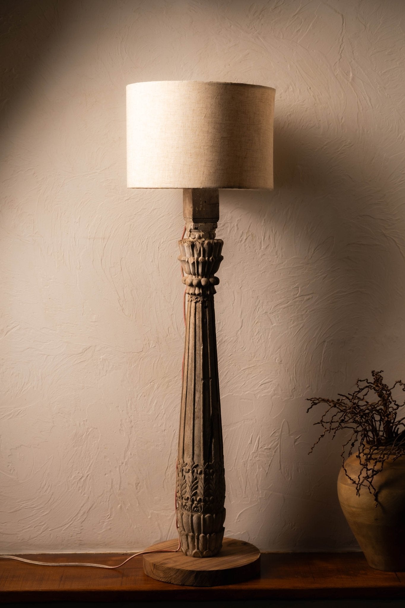 Vintage pillar-style wood floor lamp with handcrafted detailing, rustic antique finish, and elegant traditional design ideal for living rooms, bedrooms, and heritage-inspired interiors.