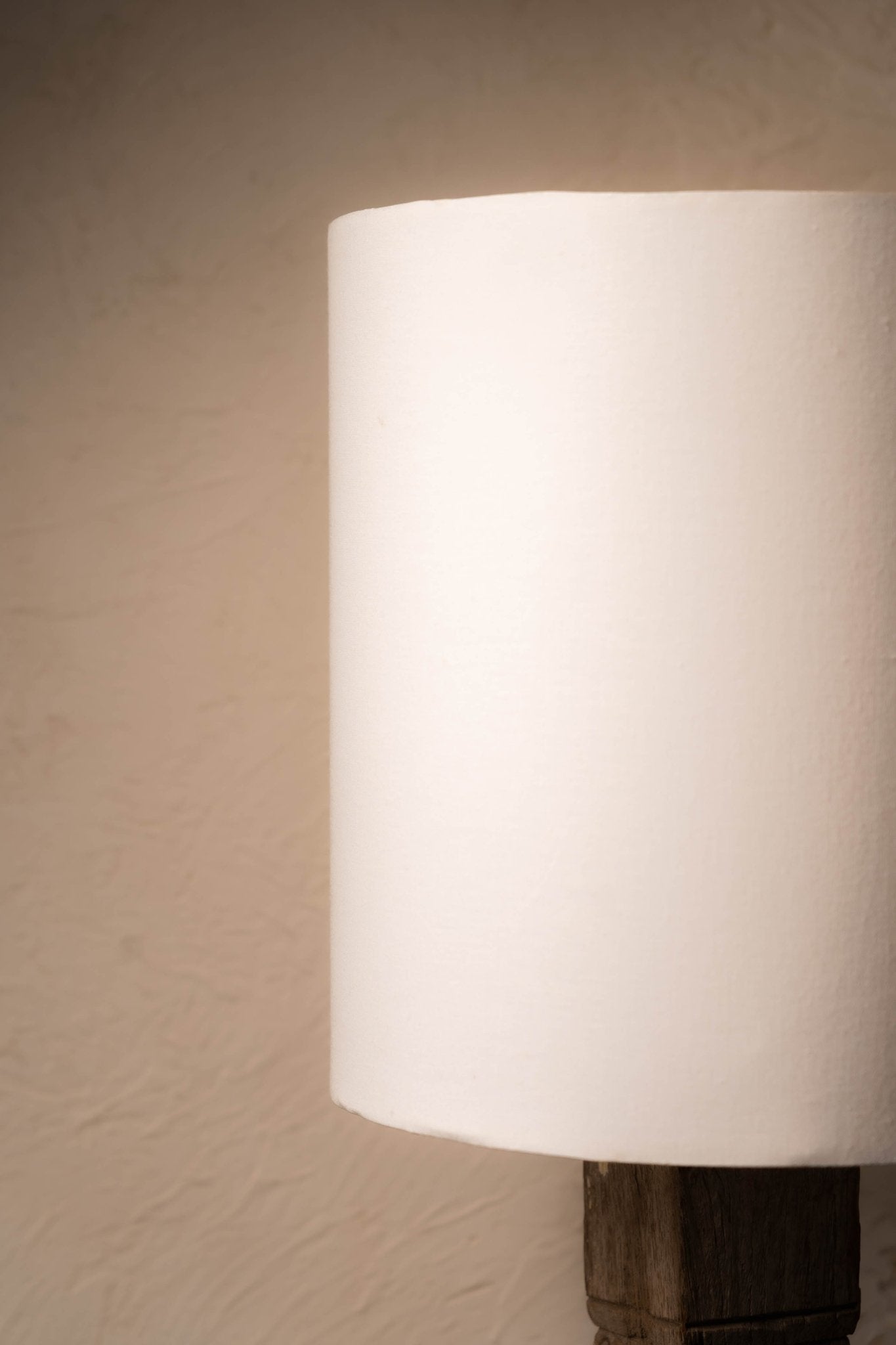 Handcrafted vintage pillar wood lamp featuring a timeless carved silhouette, warm rustic wood finish, and classic artisan charm perfect for cozy and elegant interior décor.