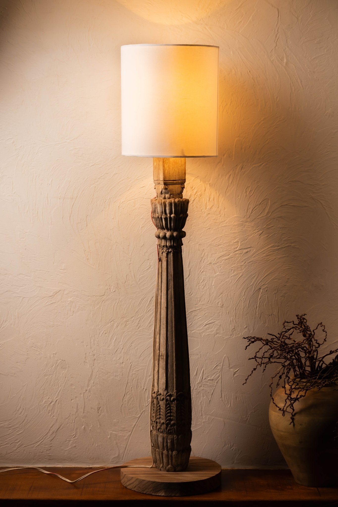 Handcrafted vintage pillar wood lamp featuring a timeless carved silhouette, warm rustic wood finish, and classic artisan charm perfect for cozy and elegant interior décor.