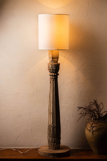 Handcrafted vintage pillar wood lamp featuring a timeless carved silhouette, warm rustic wood finish, and classic artisan charm perfect for cozy and elegant interior décor.