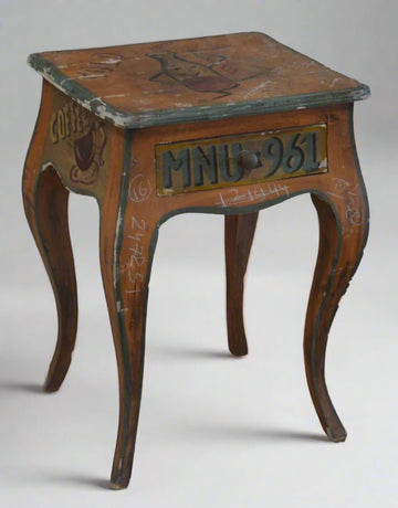 Wooden side table with 'MNU 951' label on a white background