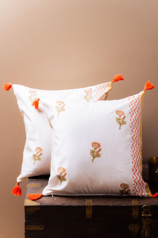Close-up of Chanderi silk weave showing intricate floral pattern in soft tones – Tesu Cushion Covers