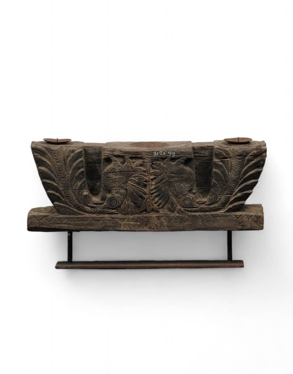 Close-up of handcrafted teak wood bracket candle stand showing natural grain, antique charm and recycled wood construction