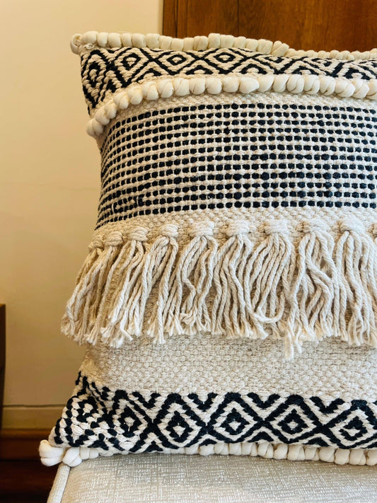 Black and white bohemian cotton cushion cover styled on sofa – Tesu Cushion Covers
