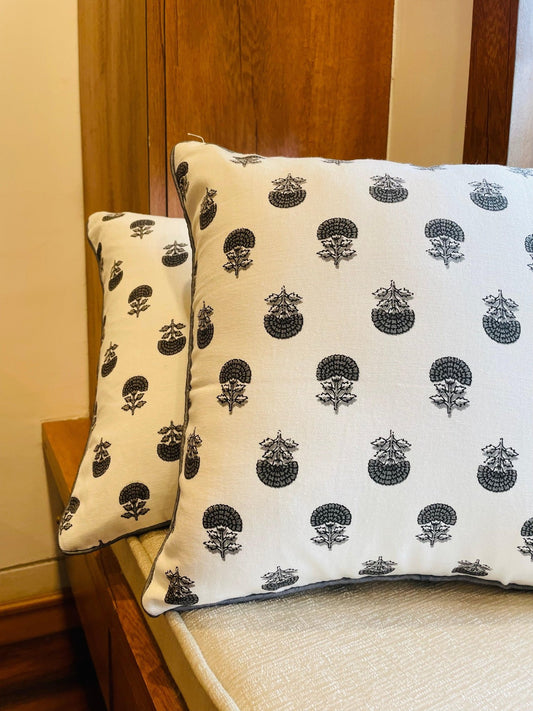 Grey and white block print cushion covers styled on armchair – Tesu Cushion Covers