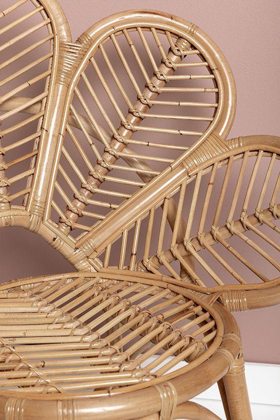 Close-up of a wicker chair with a neutral background